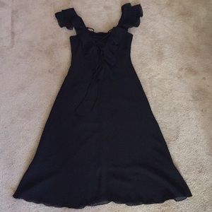 Black ruffle dress.